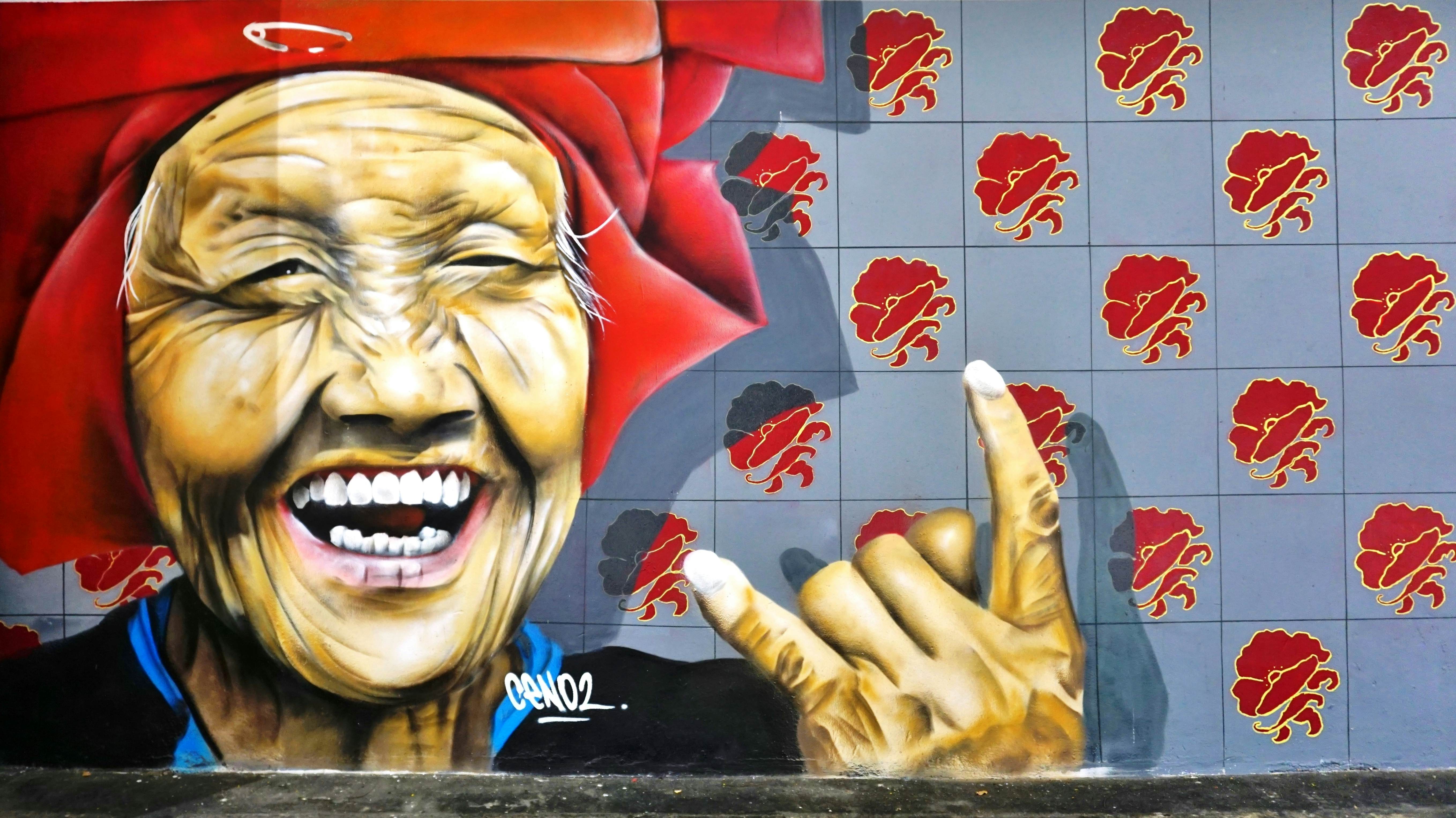 Colorful street art painted murals in Singapore.